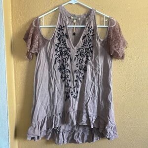 Gimmicks size S cold shoulder top with ruffles, lace and a high low feature
